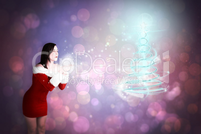 Composite image of pretty girl in santa outfit blowing