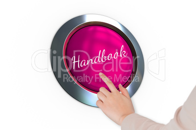 Hand pressing pink button for breast cancer awareness