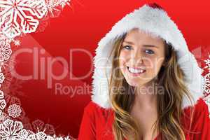 Composite image of sexy santa girl smiling at camera