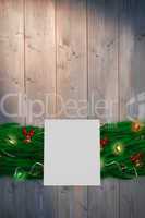 Composite image of fir branch christmas decoration garland