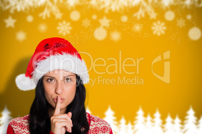 Composite image of woman holding finger to lips