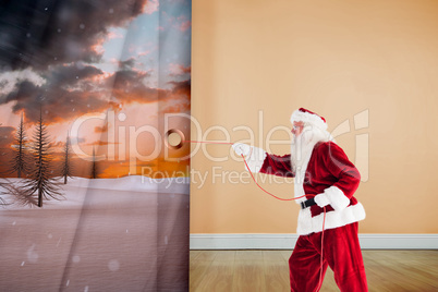 Composite image of santa pulls something with a rope Composite image of santa pulls something with a rope