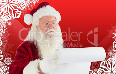 Composite image of santa claus checking his list