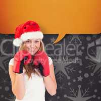 Composite image of festive blonde with boxing gloves