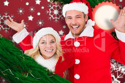 Composite image of young festive couple