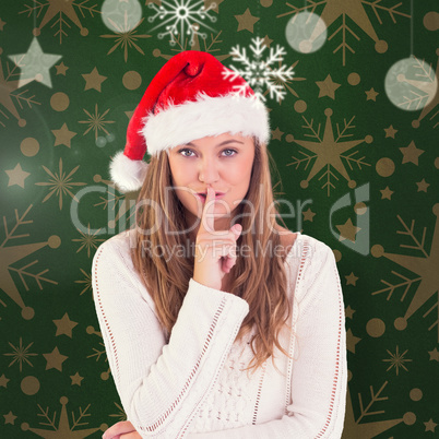 Composite image of festive blonde keeping a secret