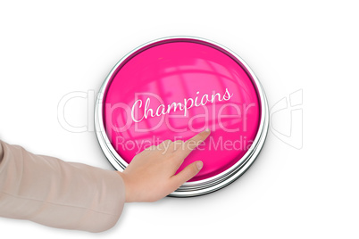 Hand pressing pink button for breast cancer awareness