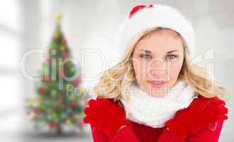 Composite image of happy festive blonde