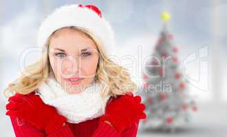 Composite image of happy festive blonde