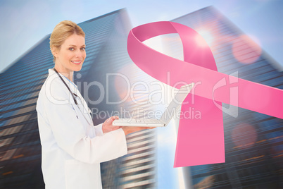 Doctor with breast cancer awareness message