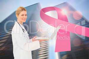 Doctor with breast cancer awareness message