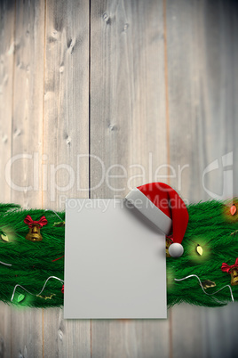 Composite image of fir branch christmas decoration garland