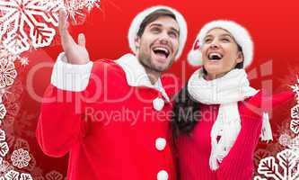 Composite image of festive young couple