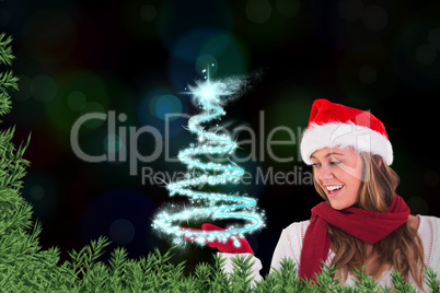 Composite image of festive blonde presenting with hand