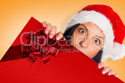 Composite image of woman surprised at the camera