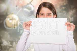 Composite image of cute little girl showing card