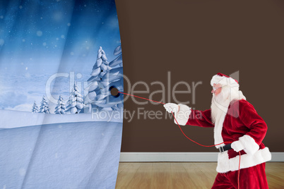 Composite image of santa pulls something with a rope