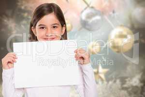 Composite image of cute little girl showing card