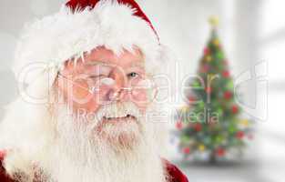 Composite image of santa claus winking