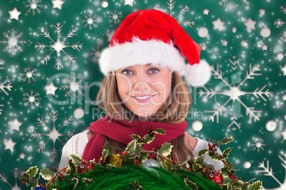 Composite image of festive blonde smiling at camera