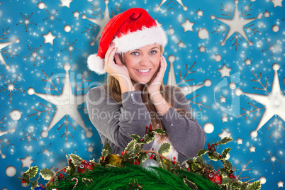 Composite image of festive blonde smiling at camera