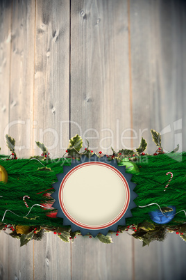 Composite image of fir branch christmas decoration garland