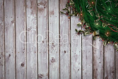 Composite image of festive christmas wreath with decorations