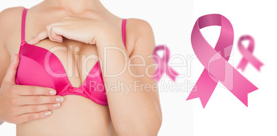 Composite image of closeup of woman performing self breast exami