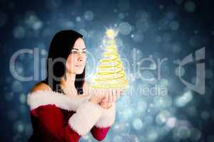 Composite image of pretty girl in santa outfit with hands out