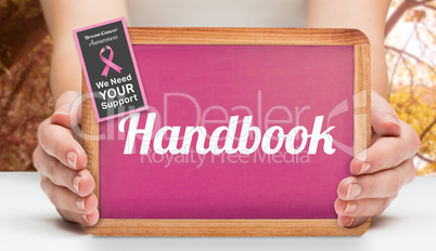 Composite image of females hands showing pink board