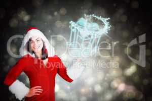 Composite image of pretty girl presenting in santa outfit