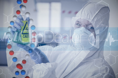 Composite image of scientist in protective suit with hazardous c