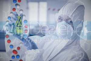 Composite image of scientist in protective suit with hazardous c