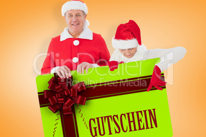 Composite image of festive couple showing poster