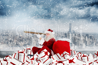 Composite image of santa looking through a telescope