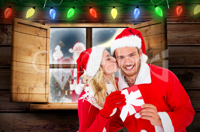 Composite image of young festive couple