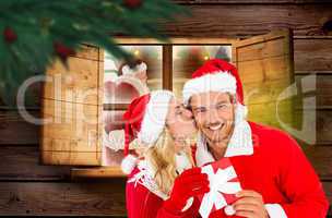 Composite image of young festive couple