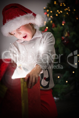 Child opening his christmas present