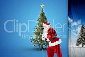 Composite image of santa claus pulling rope