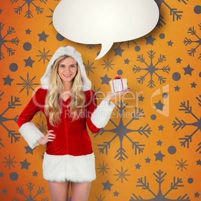 Composite image of pretty girl in santa outfit holding gift