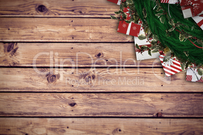 Composite image of festive christmas wreath with decorations