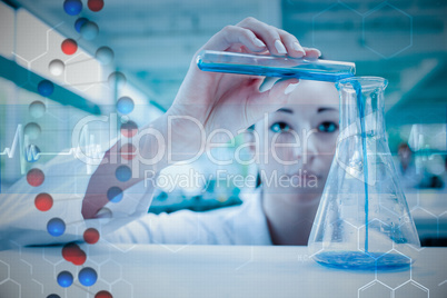 Composite image of scientist pouring a liquid in an erlenmeyer f
