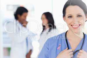 Composite image of confident nurse standing