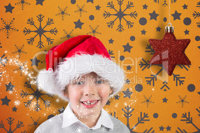 Composite image of festive boy smiling