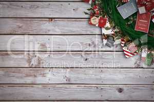 Composite image of festive christmas wreath with decorations