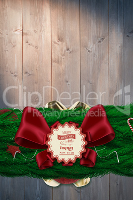 Composite image of fir branch christmas decoration garland