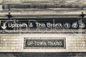 Uptown and The Bronx subway sign in New York City