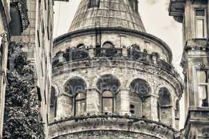 Galata Tower framed by ancient buildings - Istanbul, Turkey