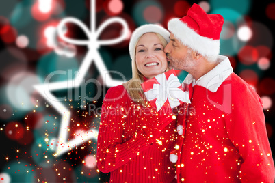 Composite image of festive couple