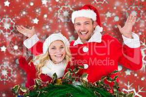 Composite image of young festive couple